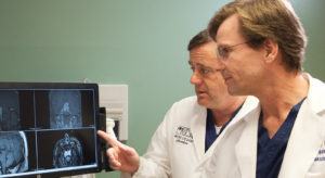 Daniel F Kelly, MD and Chester Griffiths MD FACS.