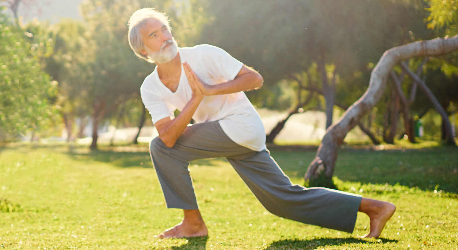 Older man doing yoga