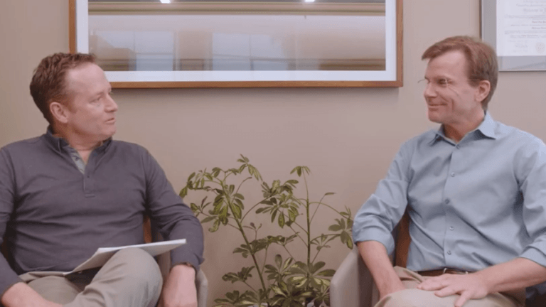 Anthony Effinger and Dr. Kelly talking to each other