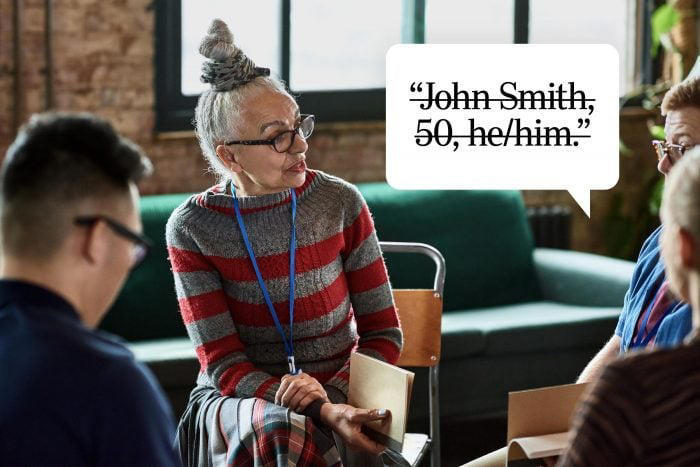 John Smith, 50, he/him.