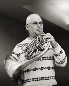 Chis plays French horn