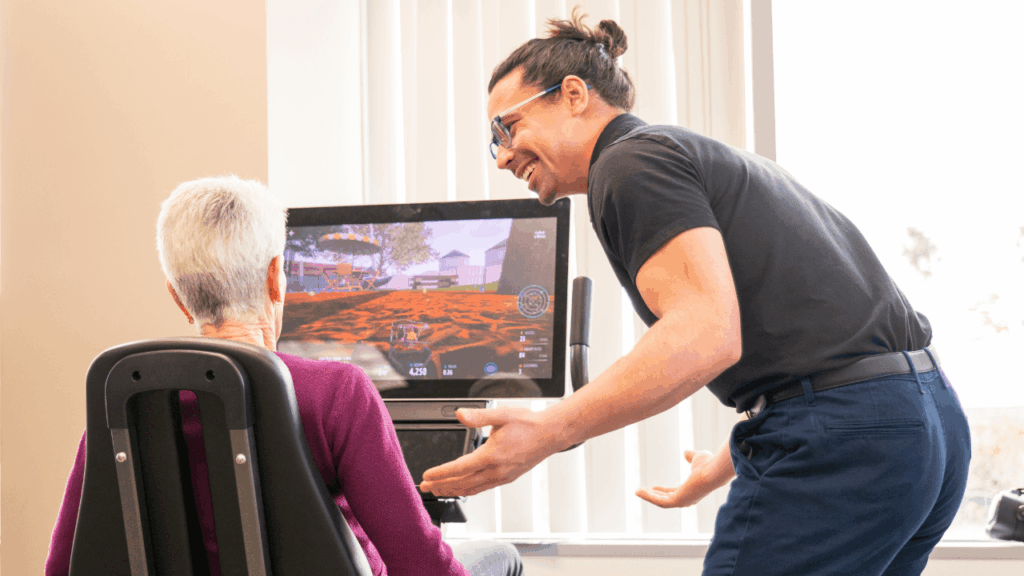 Dementia patient and instructor in the FitBrain gym