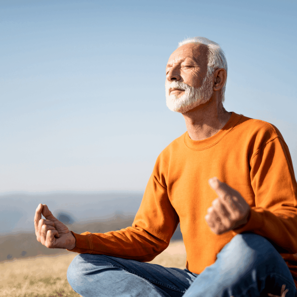 Man practicing meditating and deep breathing
