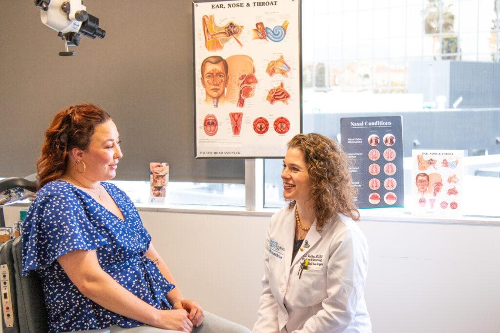 Dr. Voelker and Ayslyn in an exam room at the Pacific Neuroscience Institute