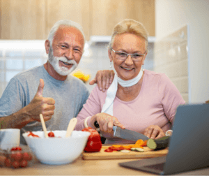 Senior couple preparing healthy food