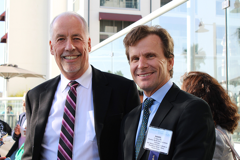 Doctor Glimp and Kelly outside at a conference