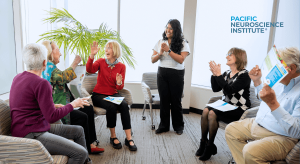 Clients sitting in a half circle in the Lifestyle Program at Pacific Neuroscience Institute.