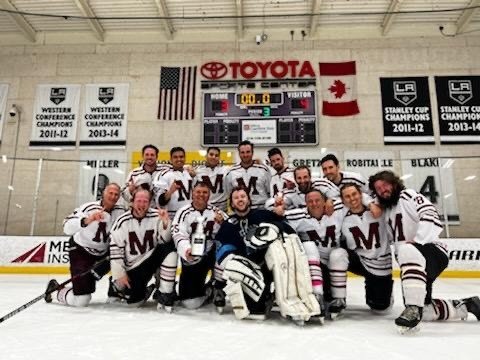 Dr. Chester Griffiths + the Maroons Hockey Team