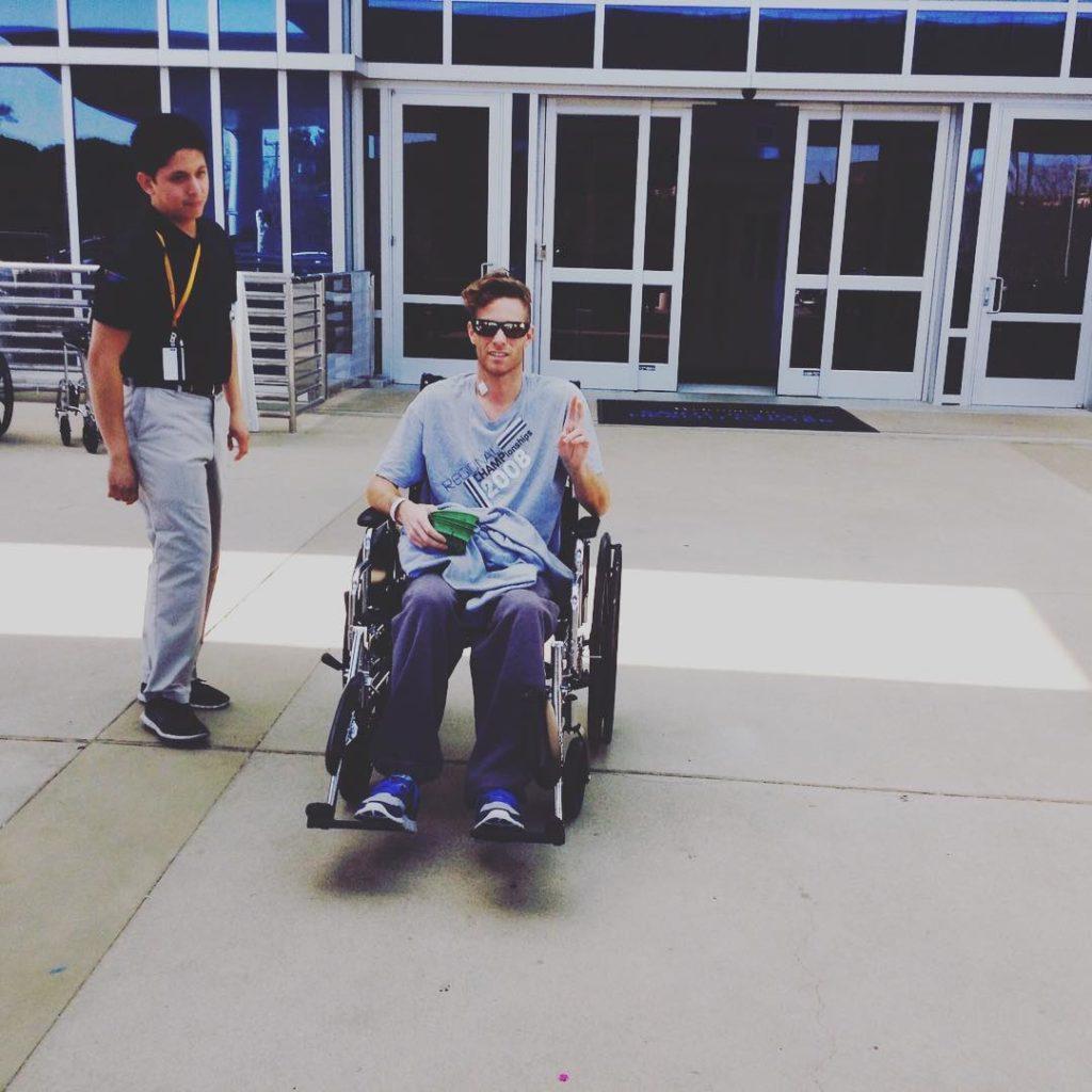 Jacques in wheelchair after brain surgery