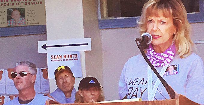 Michele Hunter at a podium