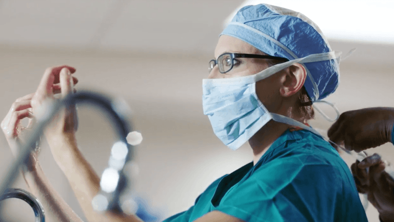 a surgeon scrubbing in for a procedure
